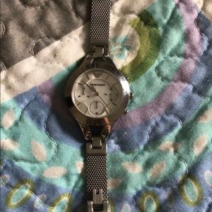 Lacoste sneakers and Armani watch